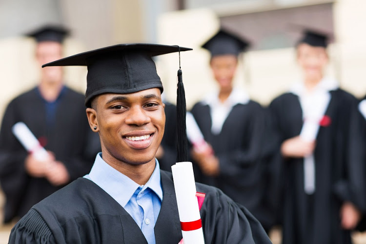 26458131 - happy african male university graduate with classmates